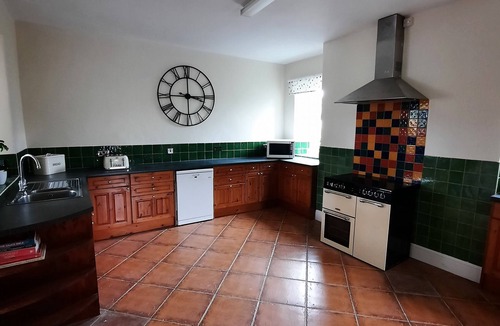 Morebath House | Devon Holiday Home. Hot Tub, Play Area & games Room Country Views. 12 Guests