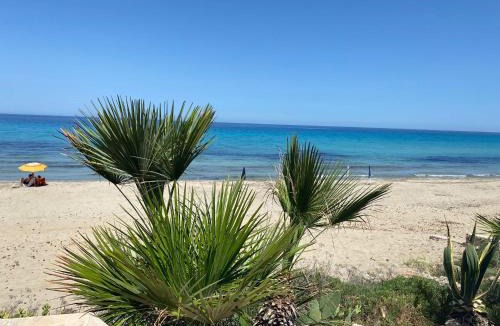Reitani Villa | Dimora Elma casa sulla spiaggia fronte mare a San Lorenzo vicino Marzamemi