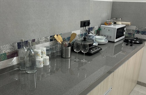 Thite Nagar Apartment | Dio by StayVio Riverfront road, 3BHK in Kharadi near EON IT Park, WTC,Magarpatta