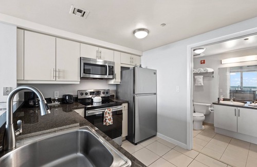 Coconut Grove Hotel | Direct Bay View Studios with Balcony & Kitchen at Coconut Grove Condo Hotel