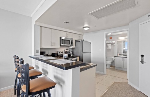 Coconut Grove Hotel | Direct Bay View Studios with Balcony & Kitchen at Coconut Grove Condo Hotel