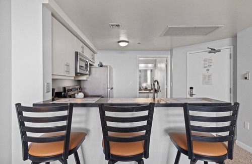 Coconut Grove Hotel | Direct Bay View Studios with Balcony & Kitchen at Coconut Grove Condo Hotel