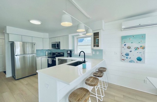 East Haven House | Direct Beachfront Modern Cottage on Private Beach