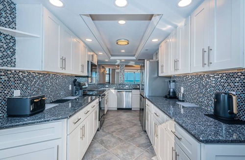 Sand Key Condo | Direct Gulf Front Southern Exposure corner unit with TWO BALCONIES! UNOBSTRUCTED Breathtaking Million Dollar Views & Magnificent Sunsets! Located in Lighthouse Towers, Clearwater Beach ~
