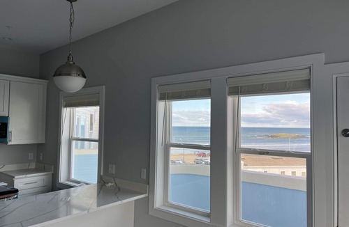 Hull House | Direct Ocean Front Condo with large wrap around balcony