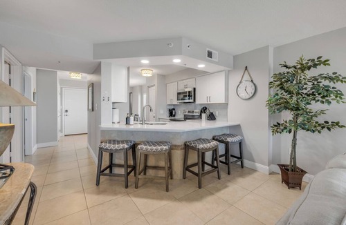 Seawinds Condo Condo | Direct oceanfront penthouse 2/2 with gorgeous corner condo views, a heated pool, and garage