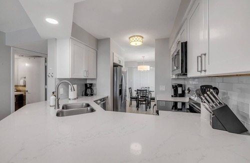 Seawinds Condo Condo | Direct oceanfront penthouse 2/2 with gorgeous corner condo views, a heated pool, and garage