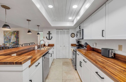 Ormond-by-the-Sea Condo | Direct oceanfront corner condo with big balcony, heated beachfront pool and garage parking