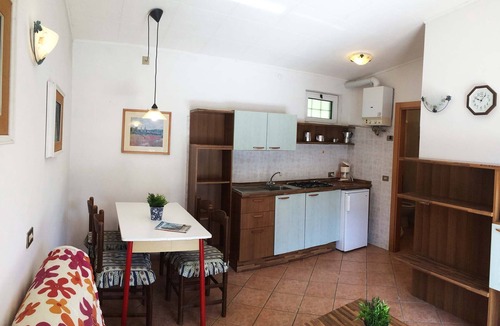 Idro Apartment | Directly on the lake with fenced garden