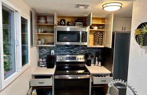 Tucson Condo | Discover cozy modern chic living in this newly renovated split-level condo!
