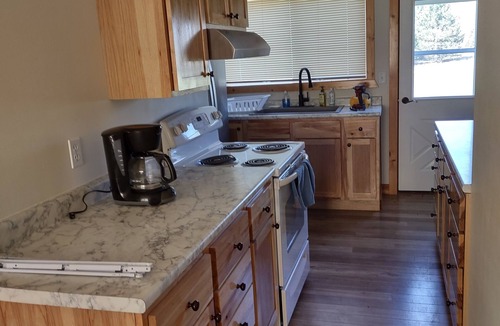 Hawkins House | Discover Hawkins charm in our 3-bedroom retreat near ATV & Snowmobile Trails.