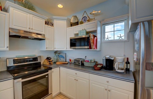 North Topsail Beach House | Discover Ocean Song—5BR beachfront home in North Topsail Beach, perfect for 15 guests!
