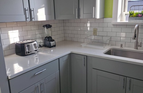 Reading House | Discover the perfect blend of simplicity and comfort in this uptown apartment