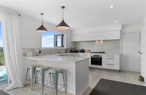 Mangawhai House | Divinity Olives - Large, stylish, sunny holiday home in a beautiful rural setting