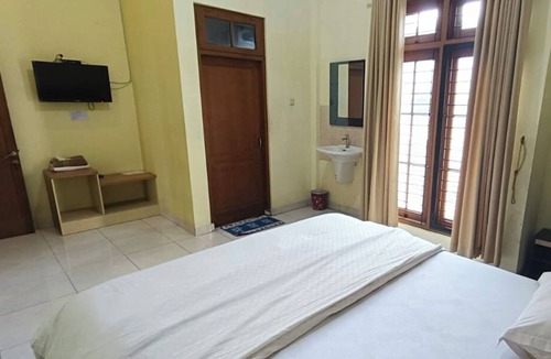 Palembang Hostel | Djuragan Kamar Macan Kumbang