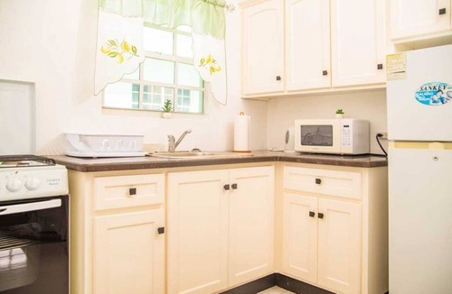 Saint Peter Parish Apartment | Doc's Paradise Red Apartment