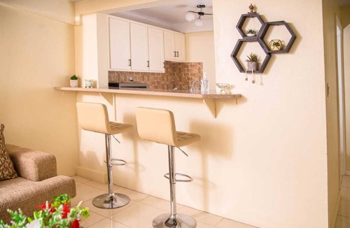 Saint Peter Parish Apartment | Doc's Paradise Red Apartment