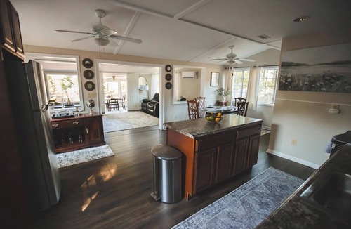 Cave Spring Cabin | Dockside Dreams at Rivers Edge Retreat – 2 bd/1ba Waterfront home on the Coosa River at Lake Weiss (GA/AL line). This updated, newly renovated ranch-style home offers the perfect setting to unplug, recharge and make wonderful lifetime memories!