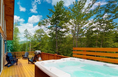 Carrabassett Valley Cabin | Dog-friendly home with large deck, hot tub, great views, & gas fireplace