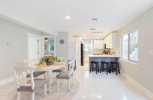 Isles of Capri Condo | Dog-friendly duplex with a patio, deck, washers, dryers, & central AC