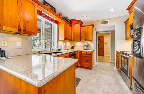 Sunland Village East House | Dog-friendly, golf course adjacent home with a pool, hot tub, & fitness center