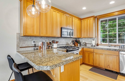 Oceanside House | Dog friendly home with ocean views deck washer dryer grill and fireplace