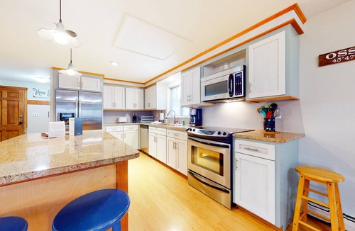 The Bluffs House | Dog-friendly home with firepit, screened porch, deck & association beach