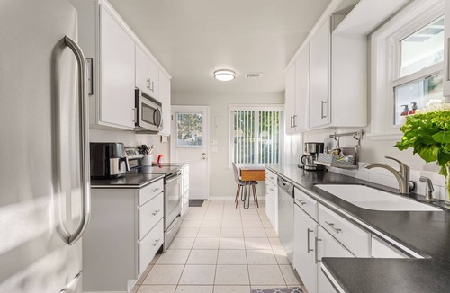 Haller Lake House | Dog-Friendly Home with a Hot Tub and Amazing Backyard