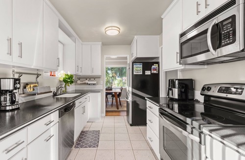 Haller Lake House | Dog-Friendly Home with a Hot Tub and Amazing Backyard