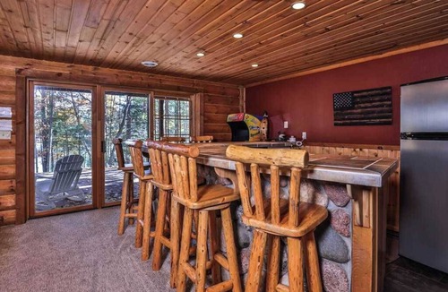 Eagle River House | Dog-friendly, lakefront lodge in the woods with large dock, central AC, & canoe