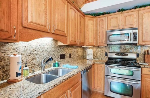 Eagle River House | Dog-friendly lakefront getaway with dock, firepit, wet bar, game room, & AC