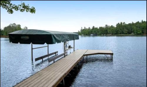 Eagle River House | Dog Friendly Lakefront Escape Dock Fire pit game room