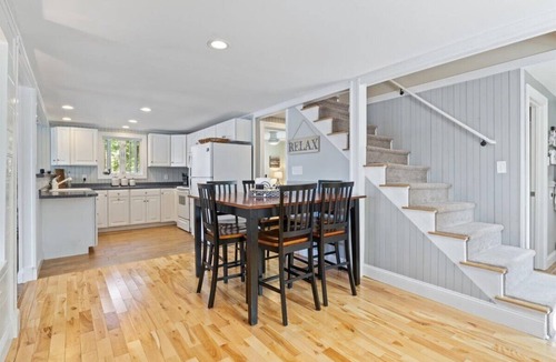 Acton House | Dog Friendly Lakefront Cottage with Private Dock and Kayaks
