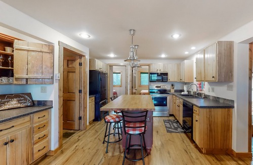 Tomahawk House | Dog-friendly lakefront home with high-speed WiFi, dock, private w/d, & firepit