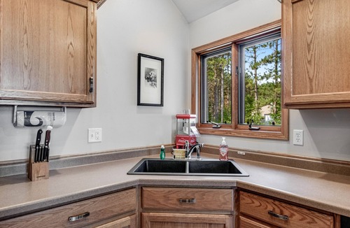Necedah House | Dog-friendly riverfront retreat with huge yard, deck, grill, firepit, & kayaks