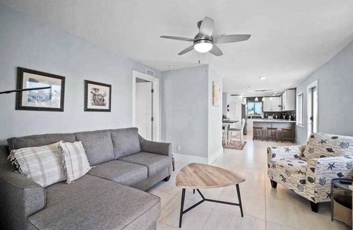 Isles of Capri Condo | Dog-friendly single-level condo with furnished patio, rooftop, & washer/dryer