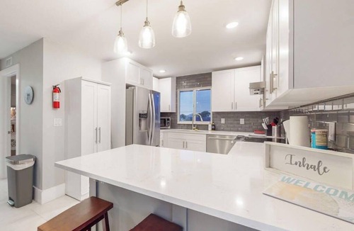 Isles of Capri Condo | Dog-friendly single-level condo with furnished patio, rooftop, & washer/dryer