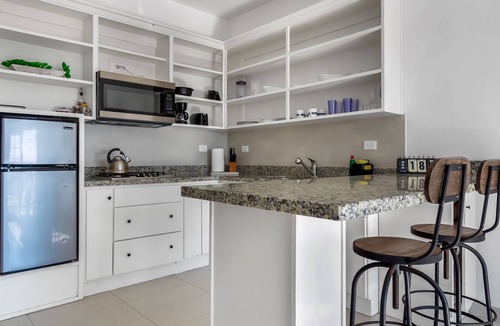 La Paloma Apartment | Dog-friendly suite with kitchenette, heated outdoor pool, hot tub, private patio