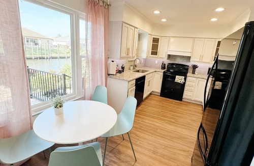 Palm Harbor House | Dog friendly summer escape: Waterfront, Game Room, Hot Tub