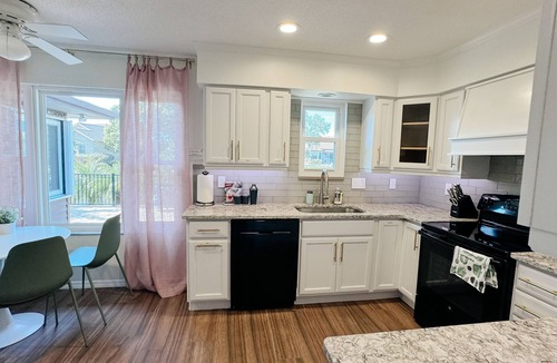 Palm Harbor House | Dog friendly summer escape: Waterfront, Game Room, Hot Tub