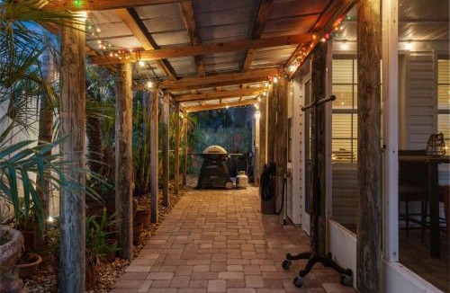 Whitney Beach House | Dolphin Cabin! Available for Summer! Screened Pool, Dock & More!