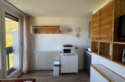 Les Menuires Apartment | Dorons Mountain Studios, ski-in ski-out, au coeur des Menuires