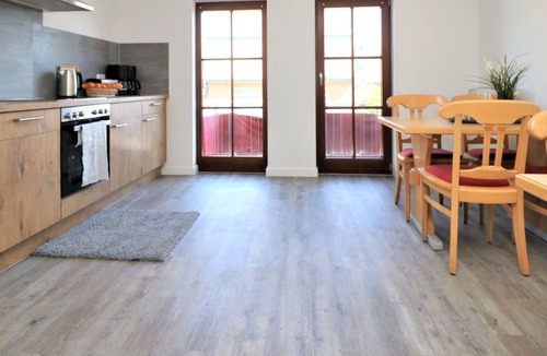 Ostseebad Wustrow Apartment | Double room with balcony and Bodden view directly at the harbor of Wustrow