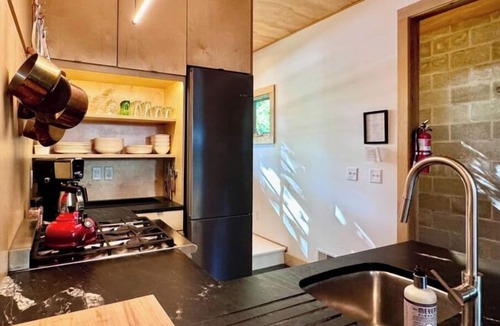 Douglas House | Douglas Hideaway | Modern home w/Hot Tub & Patio