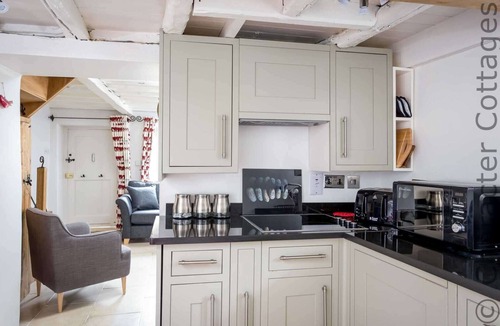 Naunton Cottage | DOVE COTTAGE (NAUNTON), pet friendly, with open fire in Naunton