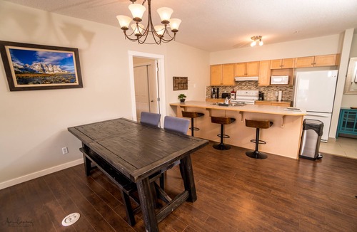 Canmore Condo | Downtown Canmore Vacation Retreat with Roof-top Hot Tub