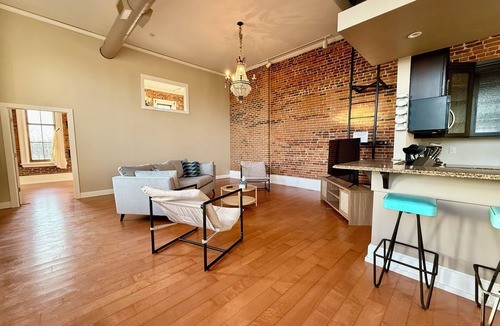 Cedar Falls Apartment | Downtown CF Retreat: King Beds, Brewery Below!