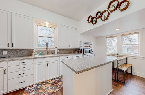 The Dalles House | Downtown cottage with furnished porch, video games, central AC, & W/D
