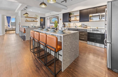 Wholesale District Apartment | Downtown Indy Double Unit Penthouse Near ICC