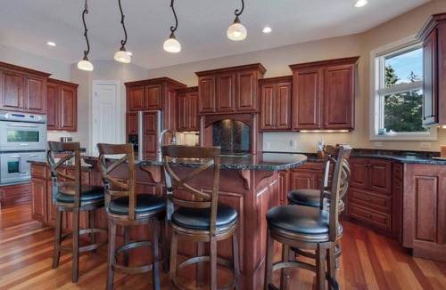 Chetek House | Downtown Lakefront Home on Lake Chetek w/hot tub & pontoon & jet ski rental
